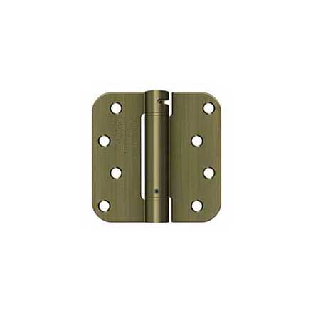 Deltana [DSH4R55] Steel Door Spring Hinge - 5/8&quot; Radius Corner - Antique Brass Finish - 4&quot; W x 4&quot; H